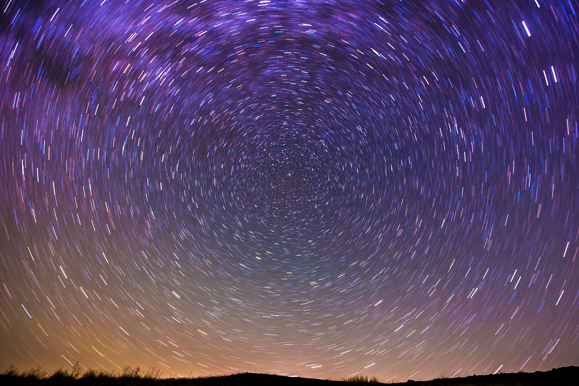 Stars blurred in the sky at sunset